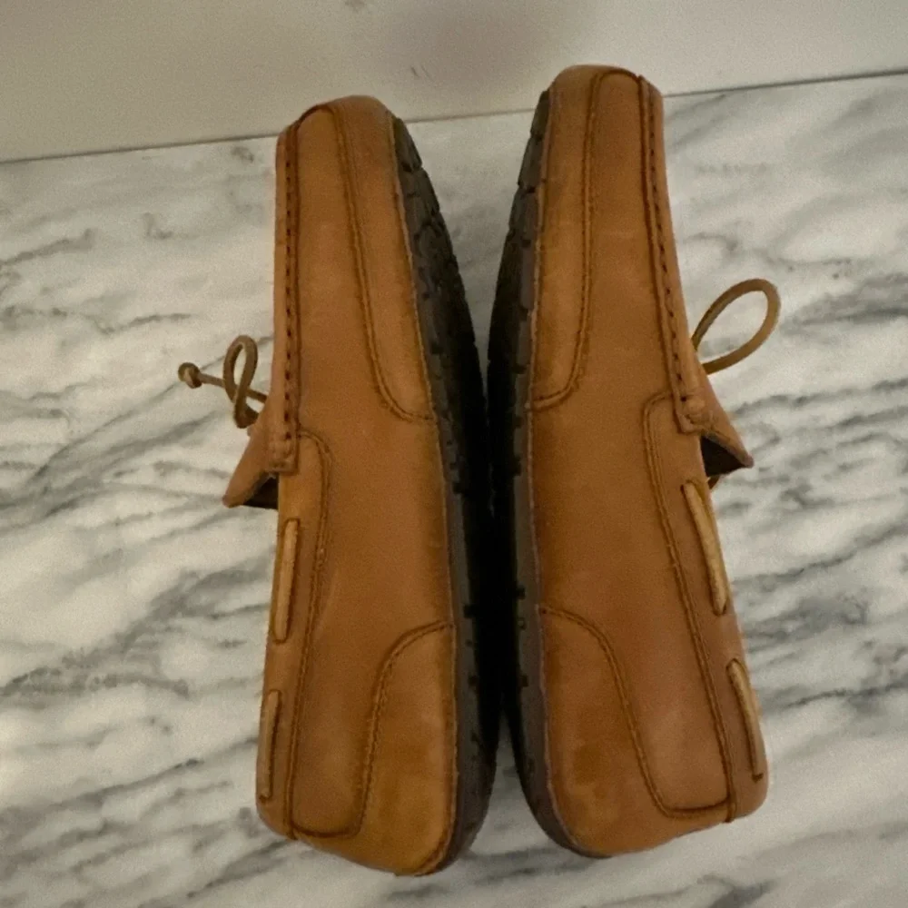 UGG Men's leather moccasin loafers brown leather fur lined men’s sz 12